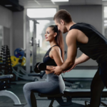 Client and Trainer Workout Routine Seated Biceps Curl